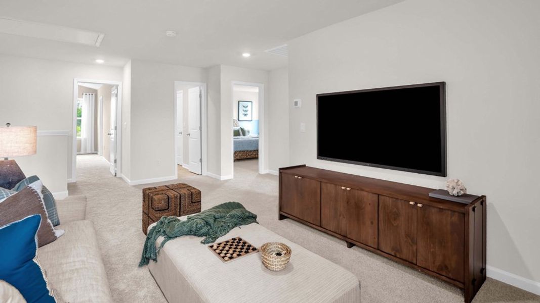 Furnished interior in a model home at Shahbain Reserve in Raeford (Image 17).