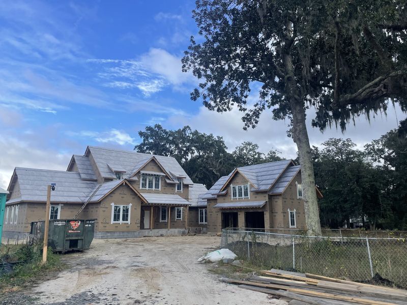 A charming home under construction with a gabled roof in The Settlement at Ashley Hall by Homes by Dickerson (Charleston, SC). A charming home under construction with a gabled roof in The Settlement at Ashley Hall by Homes by Dickerson (Charleston, SC).