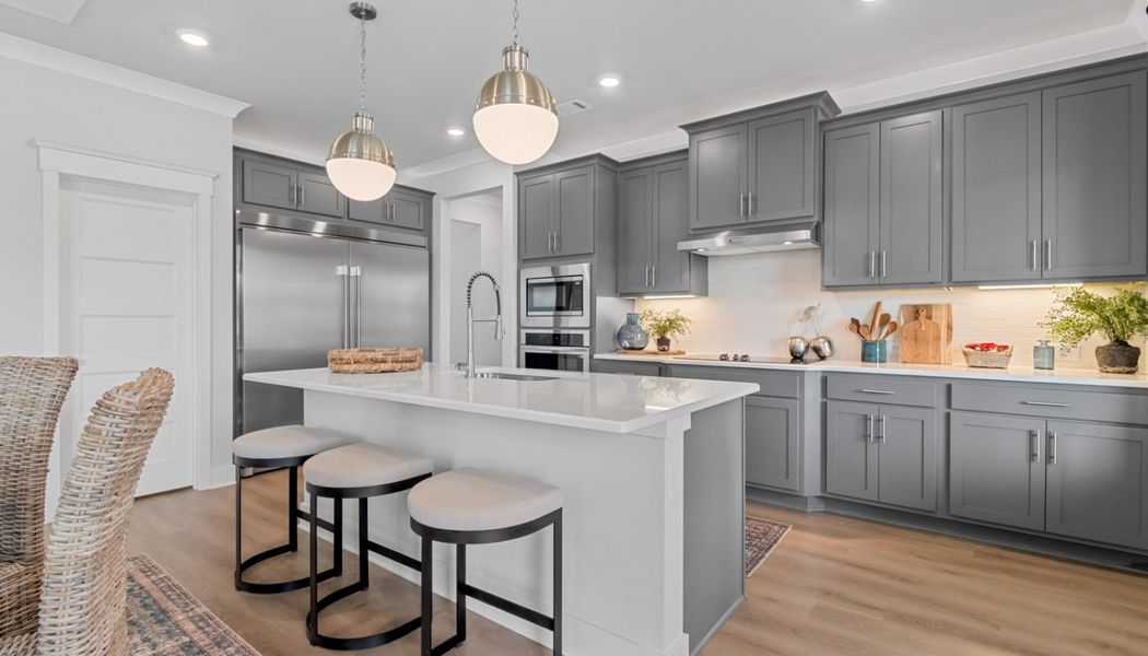 Furnished interior in a model home at Summerlin in Winder (Image 27).