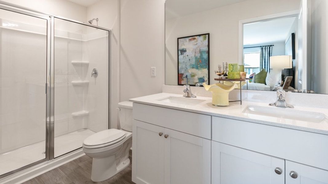 Furnished interior in a model home at The Townes at Matthews Landing in Fuquay Varina (Image 14).