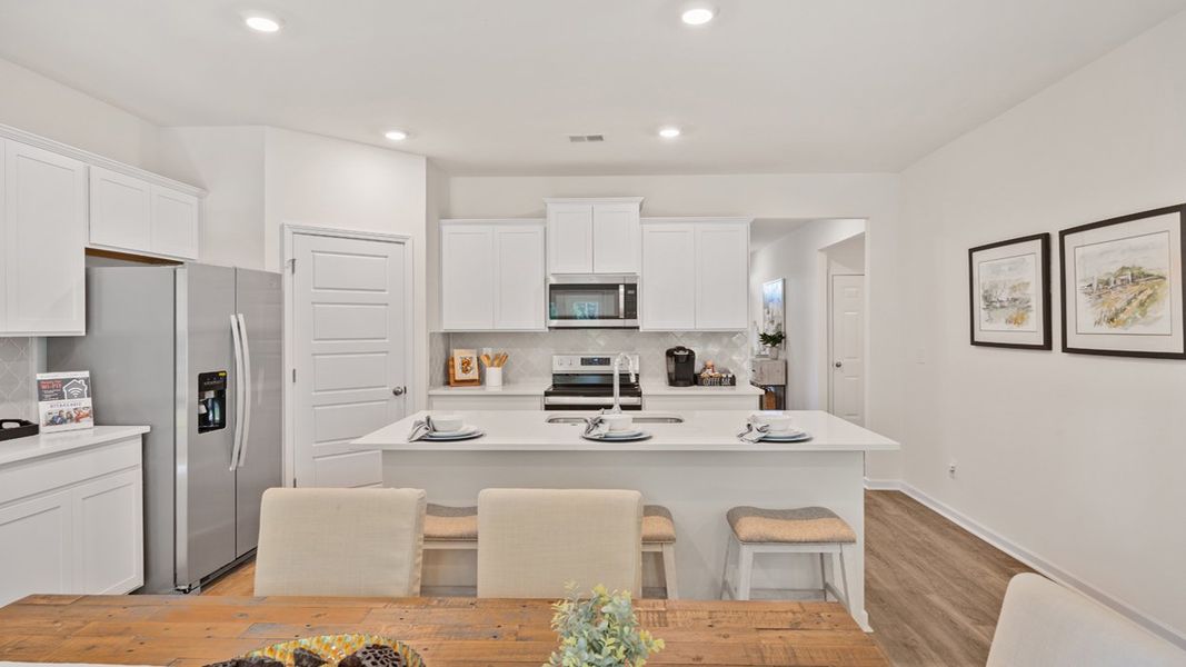 Furnished interior in a model home at Cottages at Blue Ridge in Bonaire (Image 12).