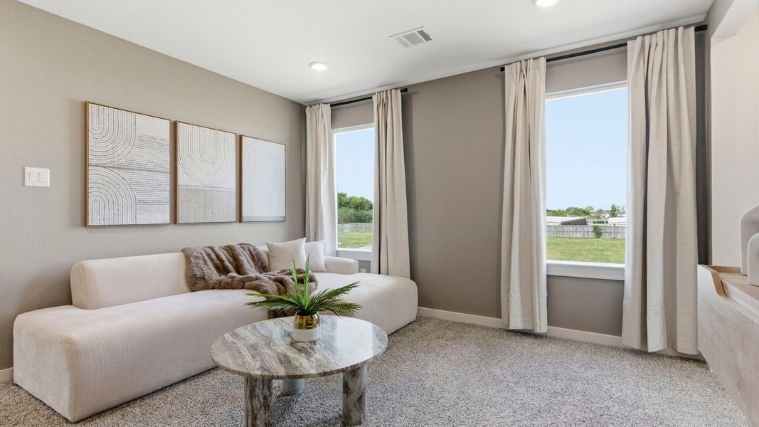 Furnished interior in a model home at Murphy Village in Missouri City (Image 17).