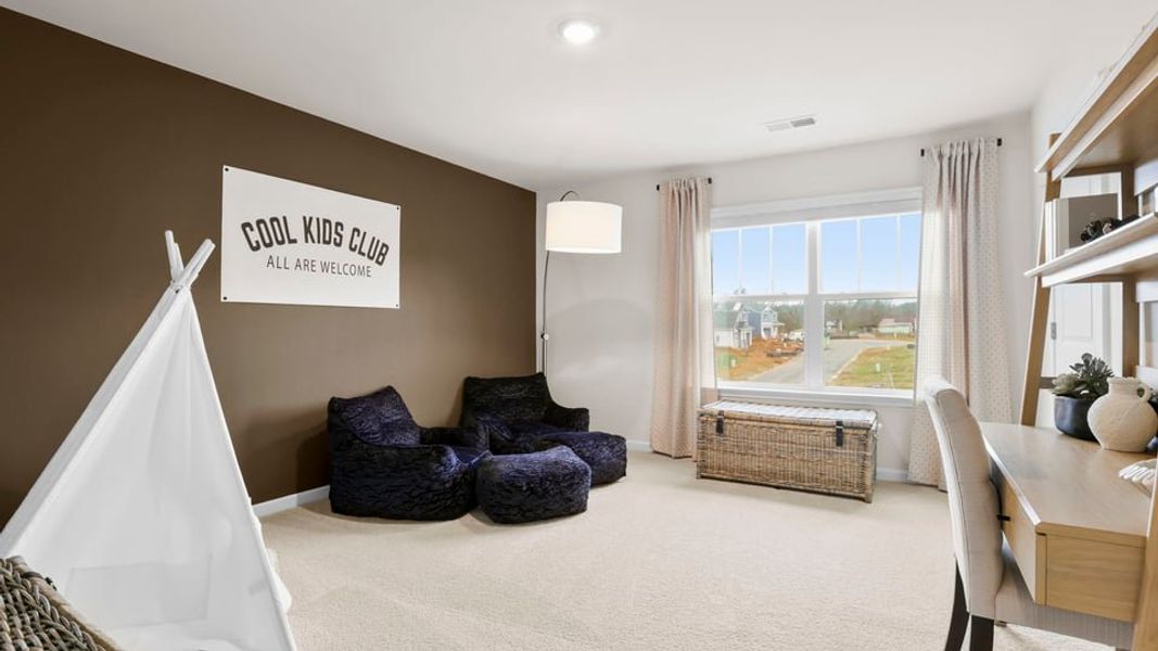 Furnished interior in a model home at Benjamin's Grove in Woodruff (Image 25).