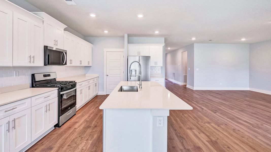 Furnished interior in a model home at Riverwood Gardens in Oakland (Image 10).