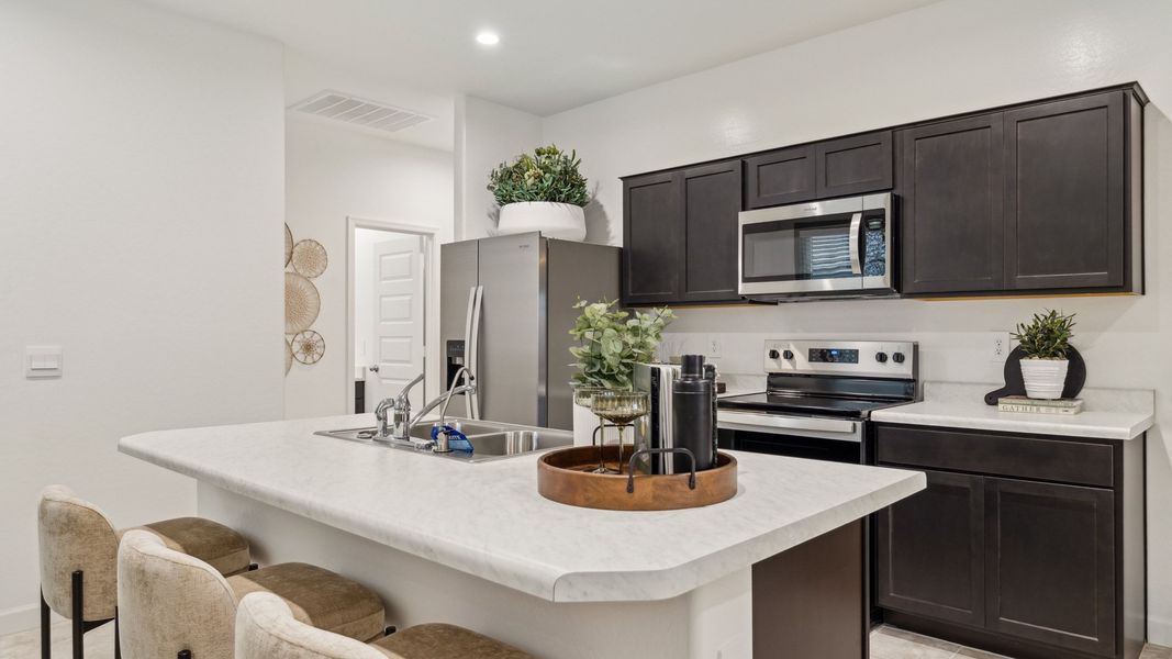 Furnished interior in a model home at Radiance at Superstition Vistas in Apache Junction (Image 8).