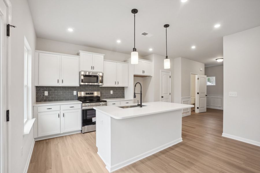 Furnished interior in a model home at Stonebridge North in Macon (Image 5).