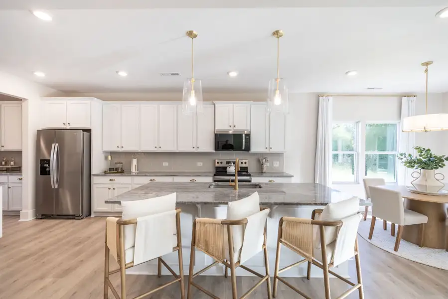 Furnished interior in a model home at Somerset Heights Single Family in Winston-Salem (Image 2).