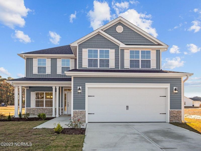 Front exterior of a home in the Mill Creek Cove community, located in Bolivia, NC (Image 4).