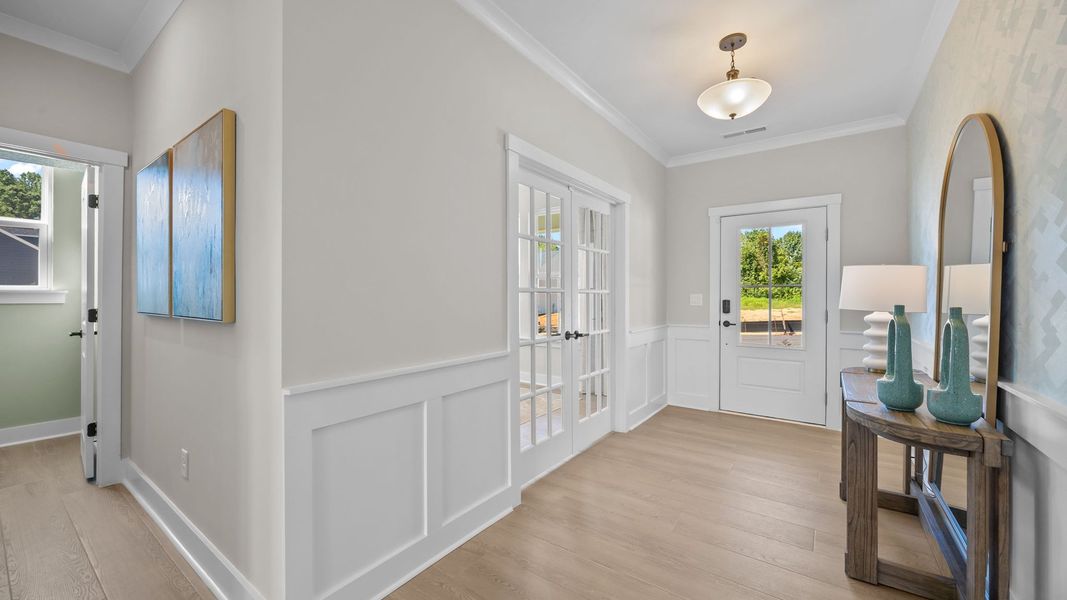 Furnished interior in a model home at Farms at Bellingham in Mooresville (Image 4).