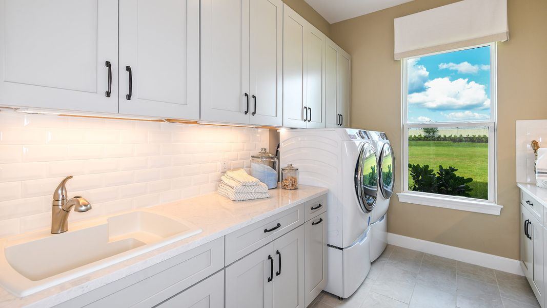 Furnished interior in a model home at Esplanade by the Islands in Naples (Image 35).