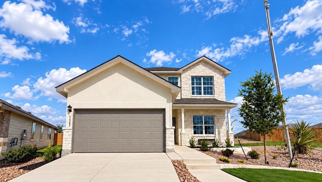 Front exterior of a home in the Redbird Ranch community, located in San Antonio, TX (Image 26).