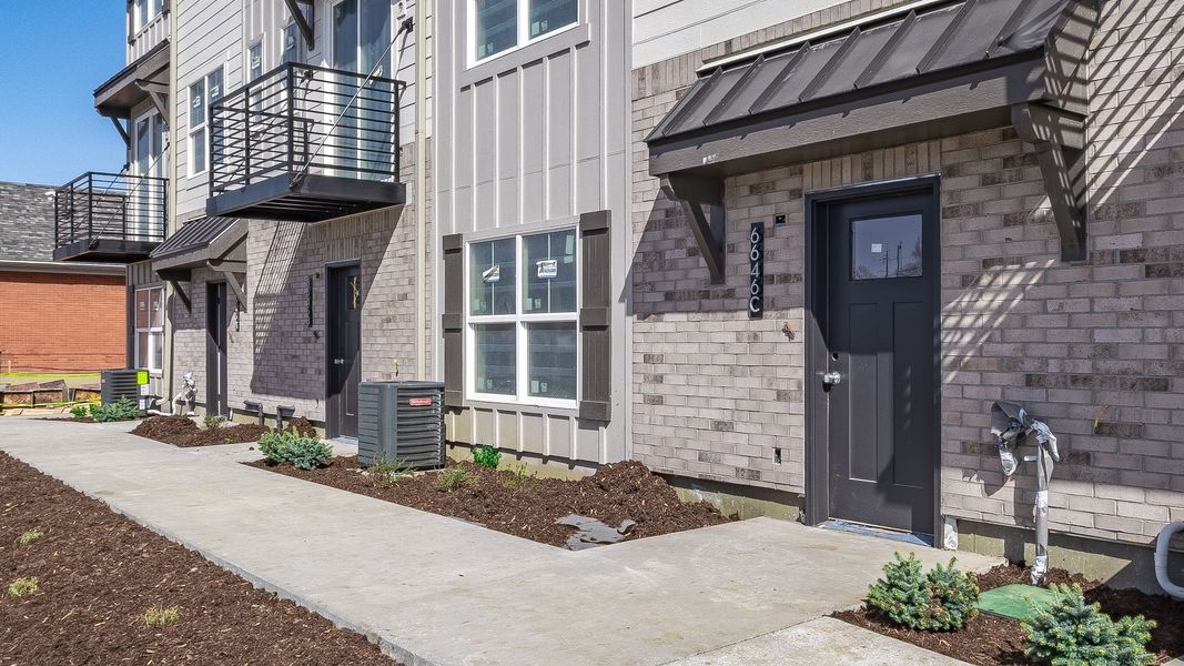 Front exterior of a home in the Parkside Arvada community, located in Arvada, CO (Image 2).