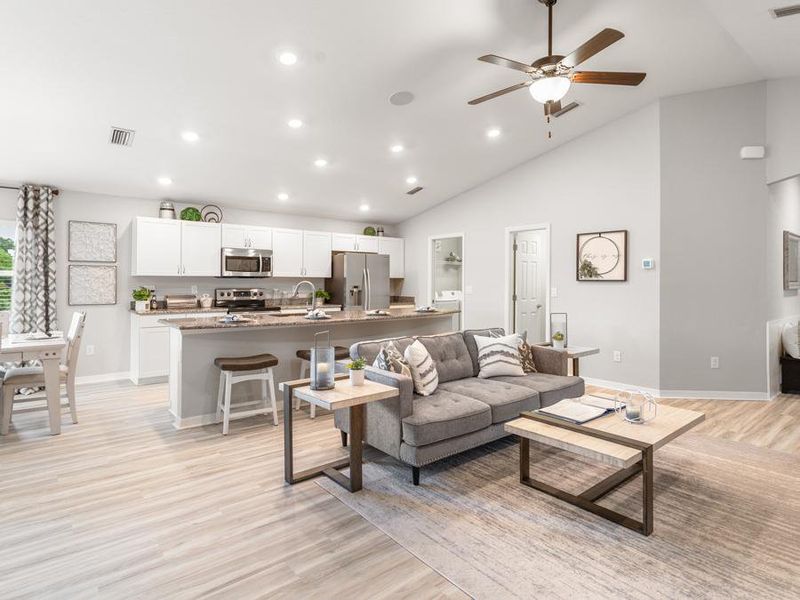 A bright and open living area is perfect for gathering with family and friends - Parker model home in Parrish, FL