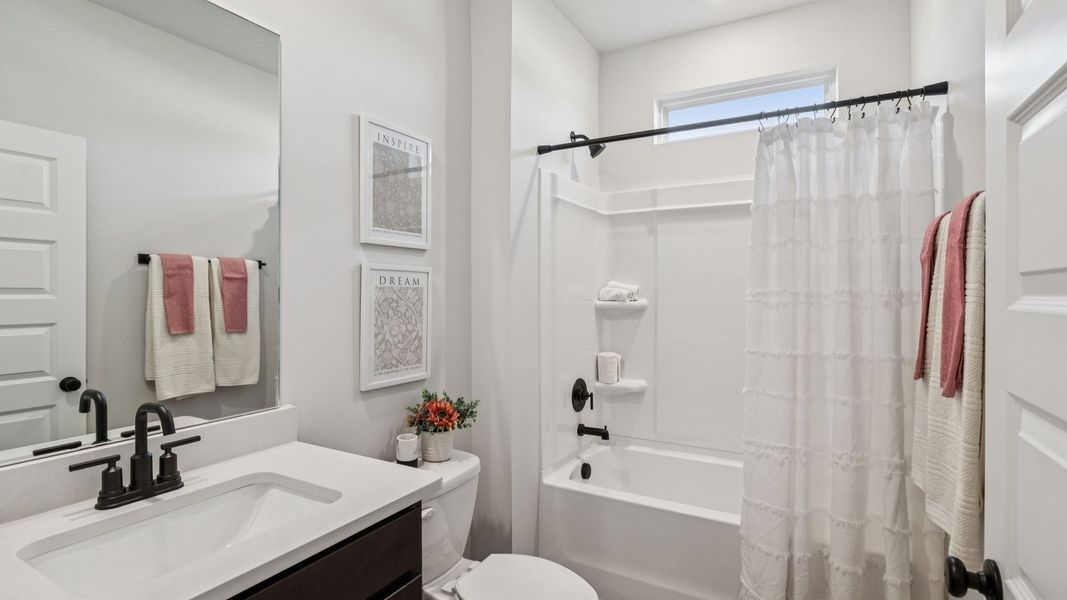 Furnished interior in a model home at Harvest Point in Spring Hill (Image 53).