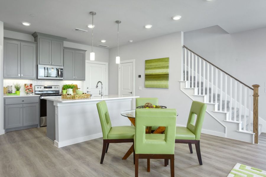 Furnished interior in a model home at Windsong Ranch Townhomes in Prosper (Image 5).