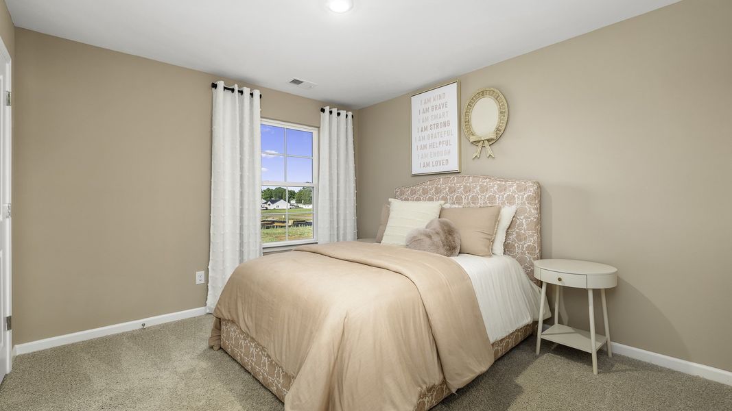 Furnished interior in a model home at Evergreen Landing in Lexington (Image 20).