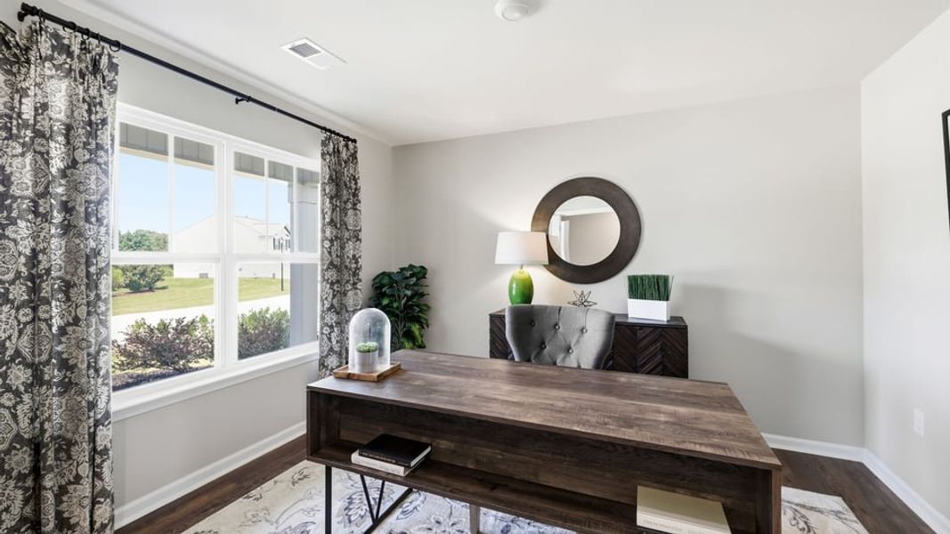 Furnished interior in a model home at Treemont Commons in Wellford (Image 9).