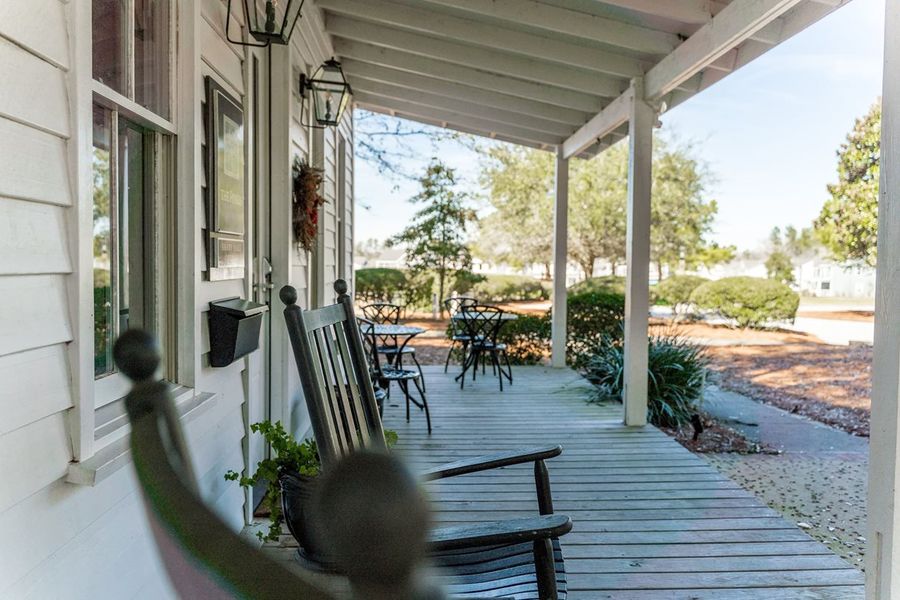 Relax on the front porch of the Shady Oak Cottage Coffee House