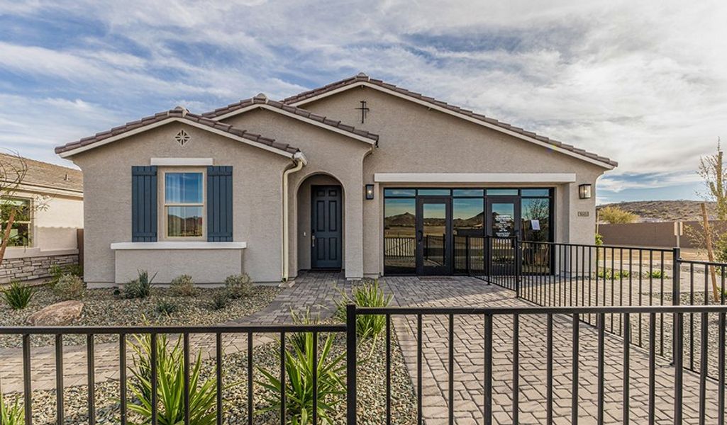 Front exterior of a home in the Seasons at Haciendas at White Peak community, located in Peoria, AZ (Image 2).
