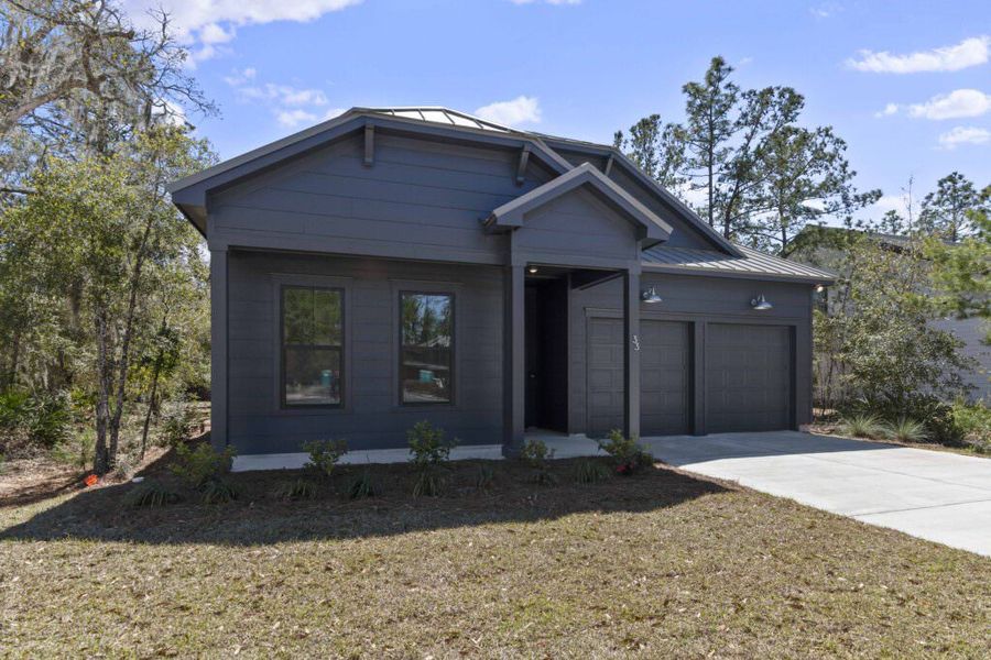 Front exterior of a home in the The Shoal community, located in Santa Rosa Beach, FL (Image 14).