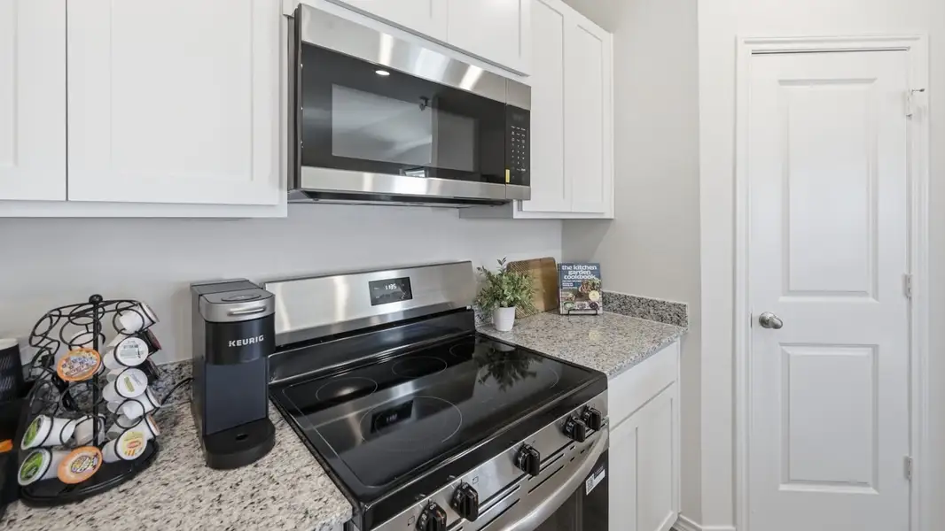 Furnished interior in a model home at Sanger Circle in Sanger (Image 9).