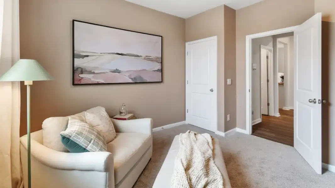 Furnished interior in a model home at Audra Oaks in Denton (Image 20).