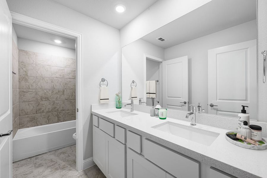 Furnished interior in a model home at The Ranch at Uptown Celina 40s in Celina (Image 32).