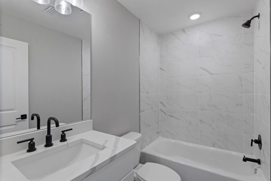 Furnished interior in a model home at The Shoal in Santa Rosa Beach (Image 34).