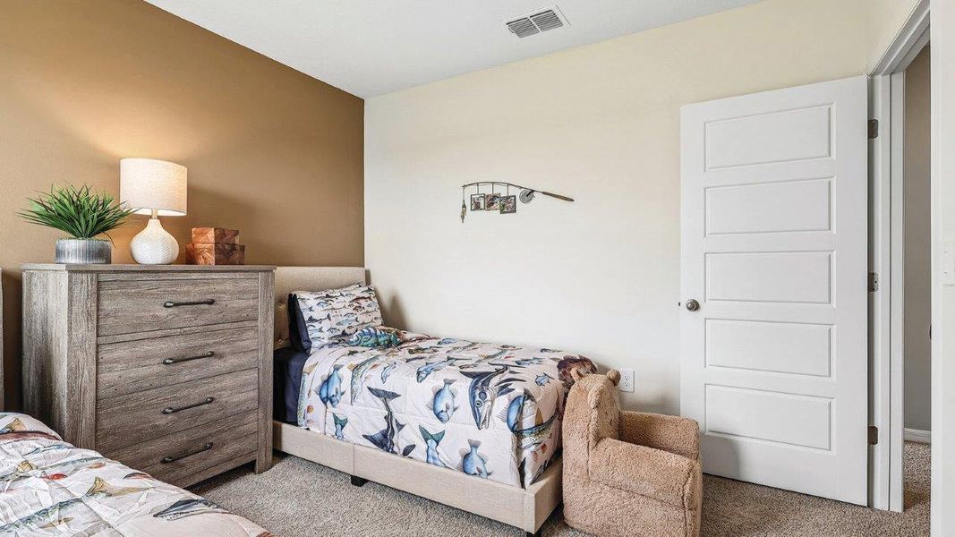 Furnished interior in a model home at Wynnstone in Davenport (Image 39).