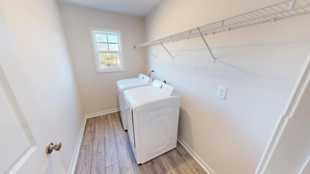 Furnished interior in a model home at Portrait Hills in Aiken (Image 17).