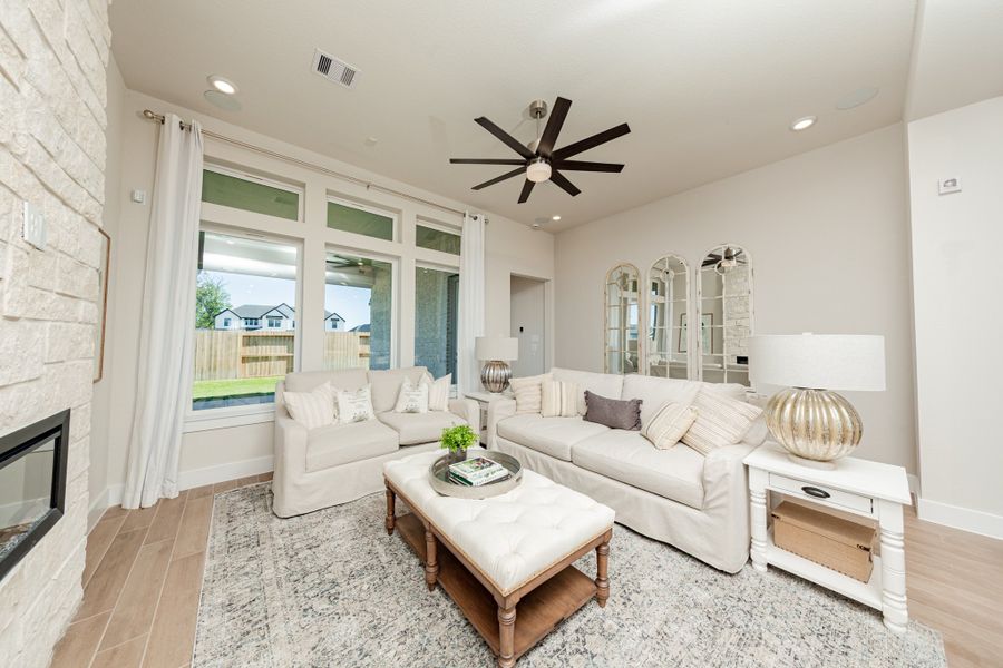 Furnished interior in a model home at Sienna in Missouri City (Image 7).