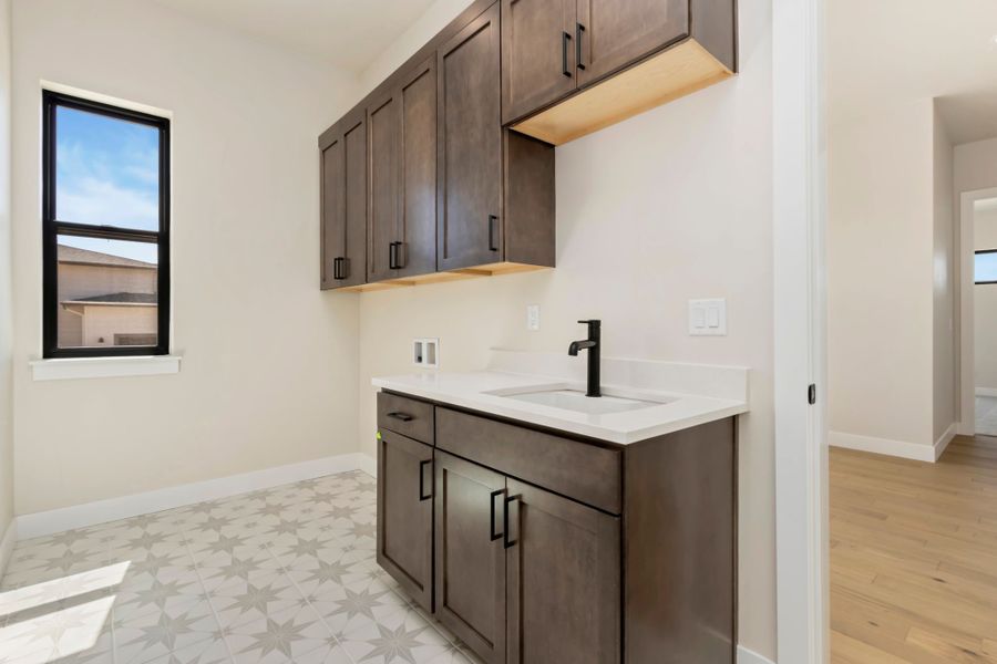 Furnished interior in a model home at Acadia at RainDance in Windsor (Image 14).