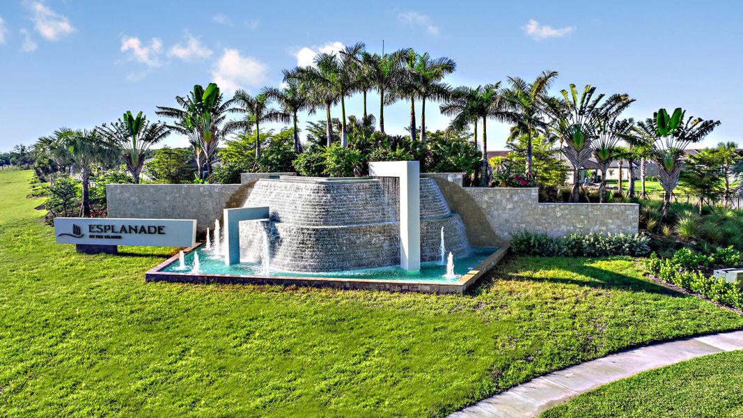 Front exterior of a home in the Esplanade by the Islands Coach Homes community, located in Naples, FL (Image 3).