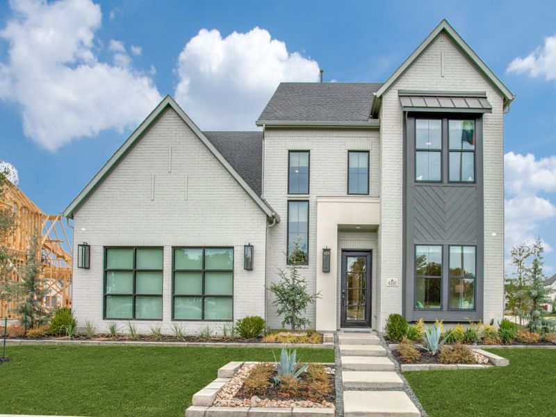 Front exterior of a home in the Windsong Ranch 61' Series community, located in Prosper, TX (Image 5).