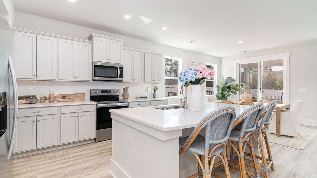 Furnished interior in a model home at Heron Pointe in Myrtle Beach (Image 4).