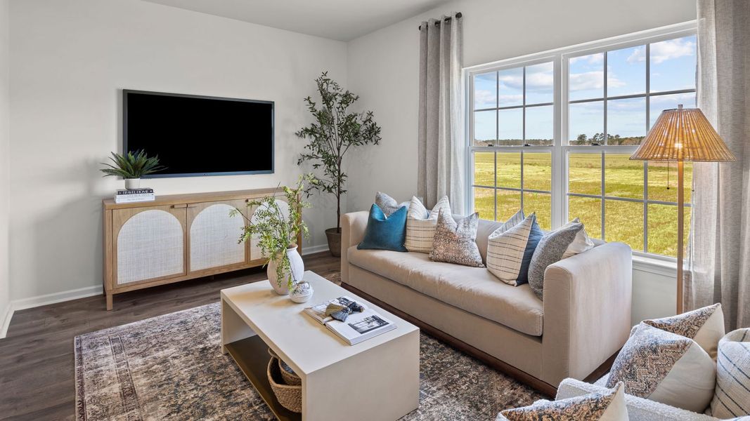 Furnished interior in a model home at East Ridge in Ayden (Image 3).