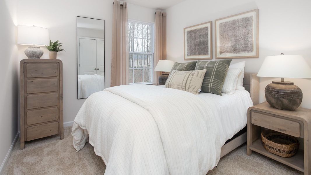 Furnished interior in a model home at The Townes at Riley's Meadow in Haw River (Image 14).