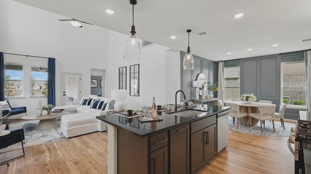 Exquisite open-concept design with high ceilings and luxurious wood floors in Westridge community.