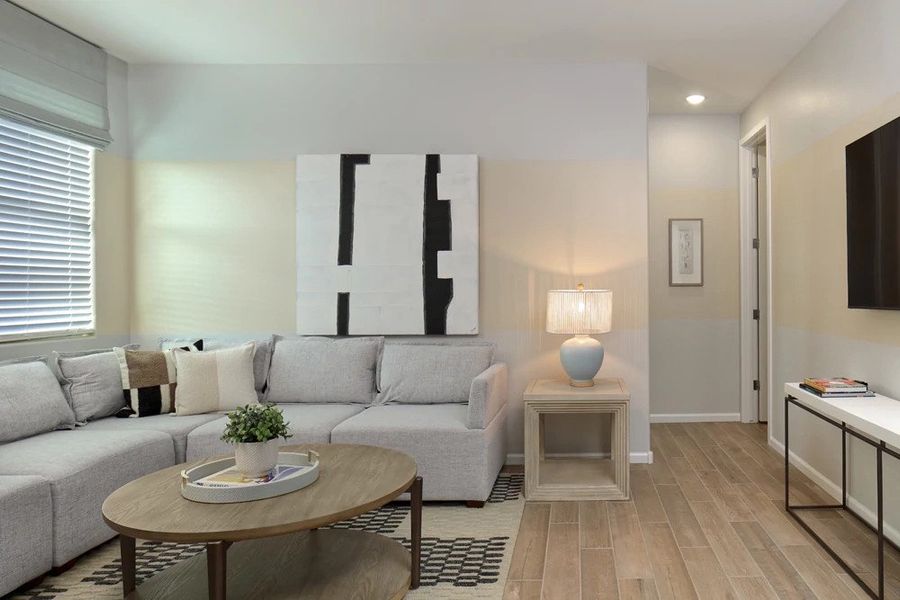 Furnished interior in a model home at Retreat at Stonebridge Manor in Waddell (Image 8).