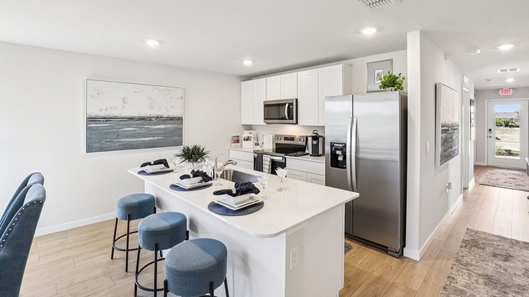 Furnished interior in a model home at Asher Park in Lehigh Acres (Image 23).