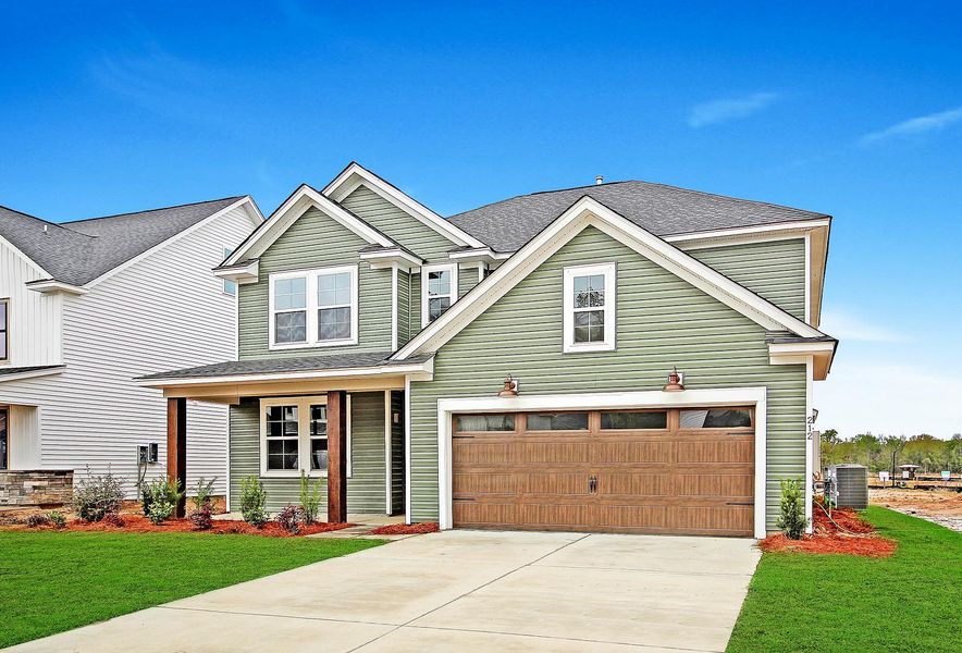 Front exterior of a home in the Huckleberry Estates community, located in Conway, SC (Image 7). Front exterior of a home in the Huckleberry Estates community, located in Conway, SC (Image 7).