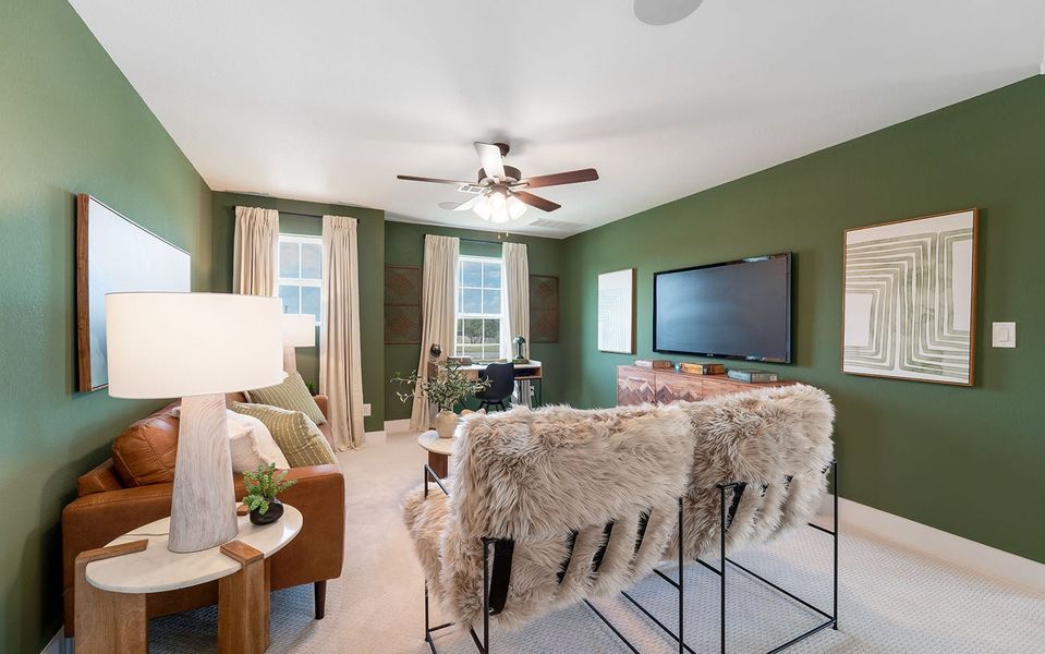 Furnished interior in a model home at Grande Estates in Bertram (Image 32).