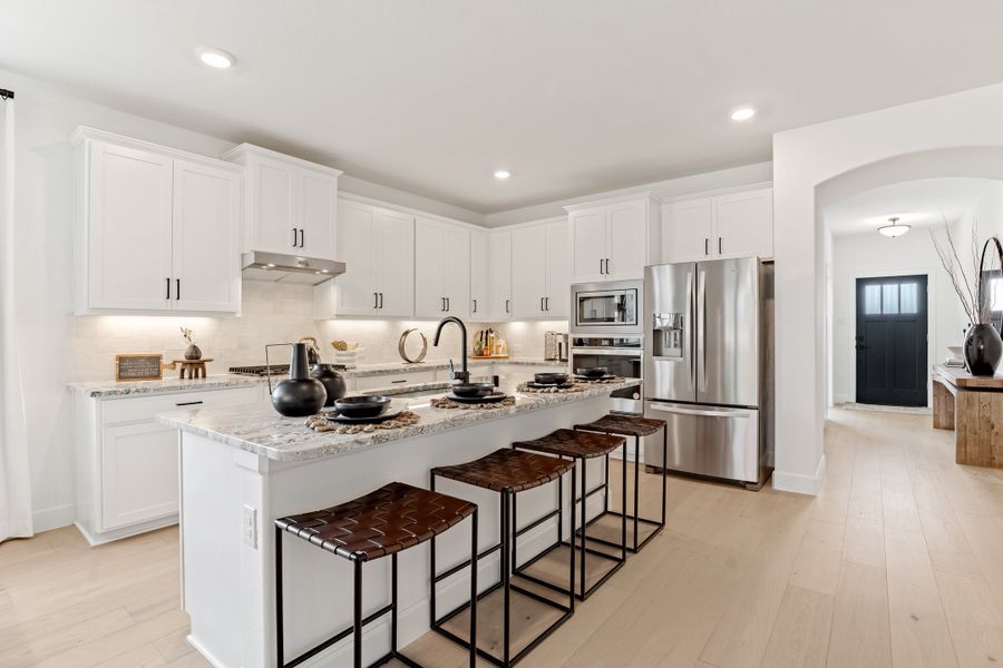 Furnished interior in a model home at Saratoga: Fields 40' in Aubrey (Image 3).