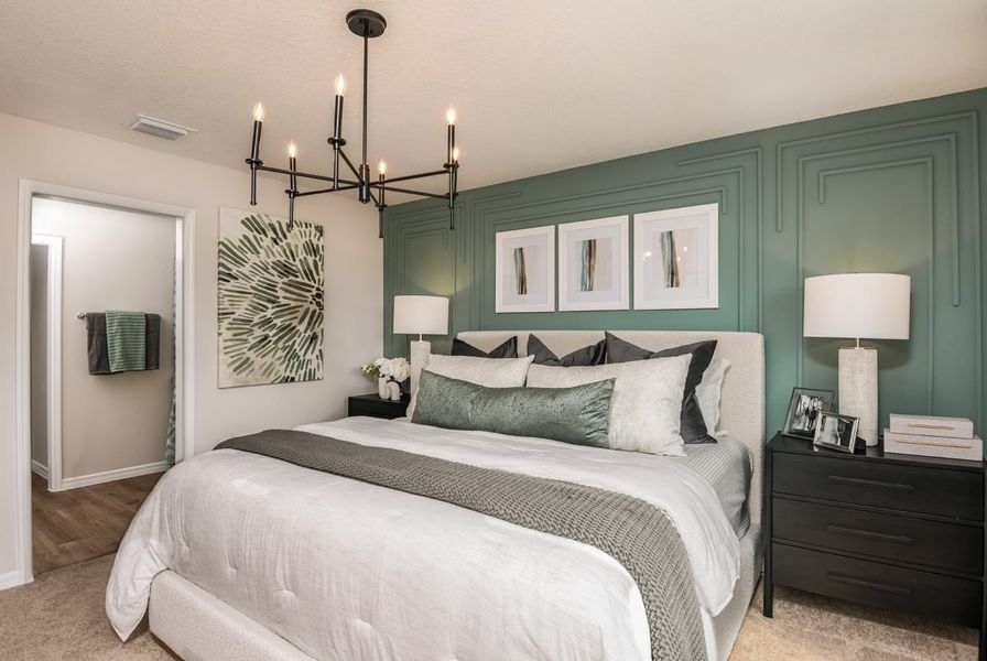 Furnished interior in a model home at Grove at Crosswinds in Haines City (Image 7).