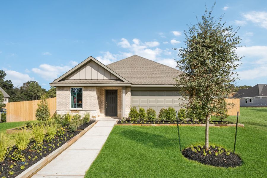 Front exterior of a home in the Crighton Cove community, located in Conroe, TX (Image 3). Front exterior of a home in the Crighton Cove community, located in Conroe, TX (Image 3).