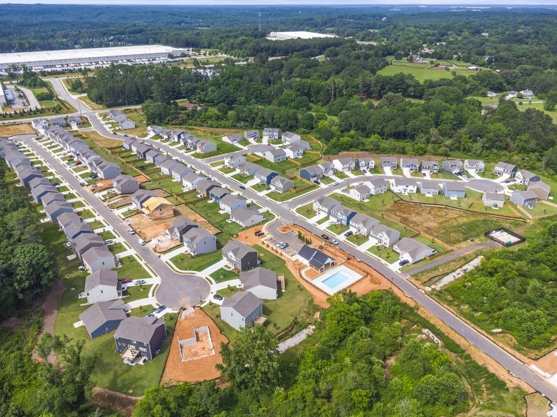 Aerial view of the Crossvine Estates community in Hoschton, GA, showing layout and nearby surroundings (Image 13).