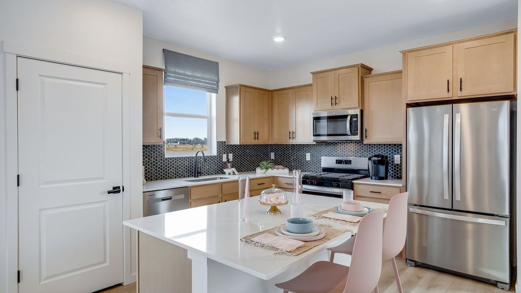 Furnished interior in a model home at Granary in Johnstown (Image 6).