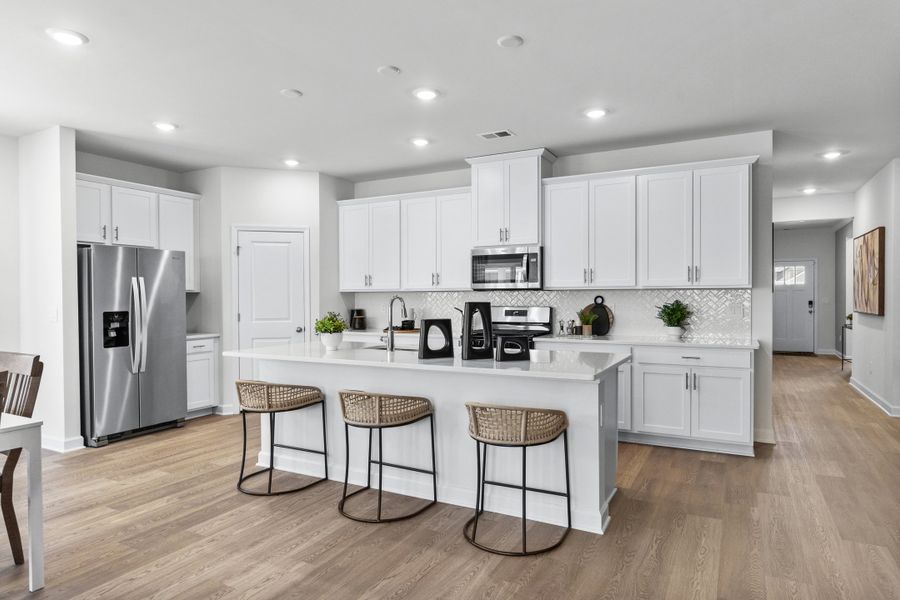 Furnished interior in a model home at Crown Pointe in Georgetown (Image 5).