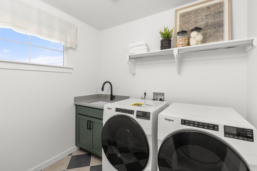 Barefoot Lakes Plan V433 laundry room by American Legend Homes