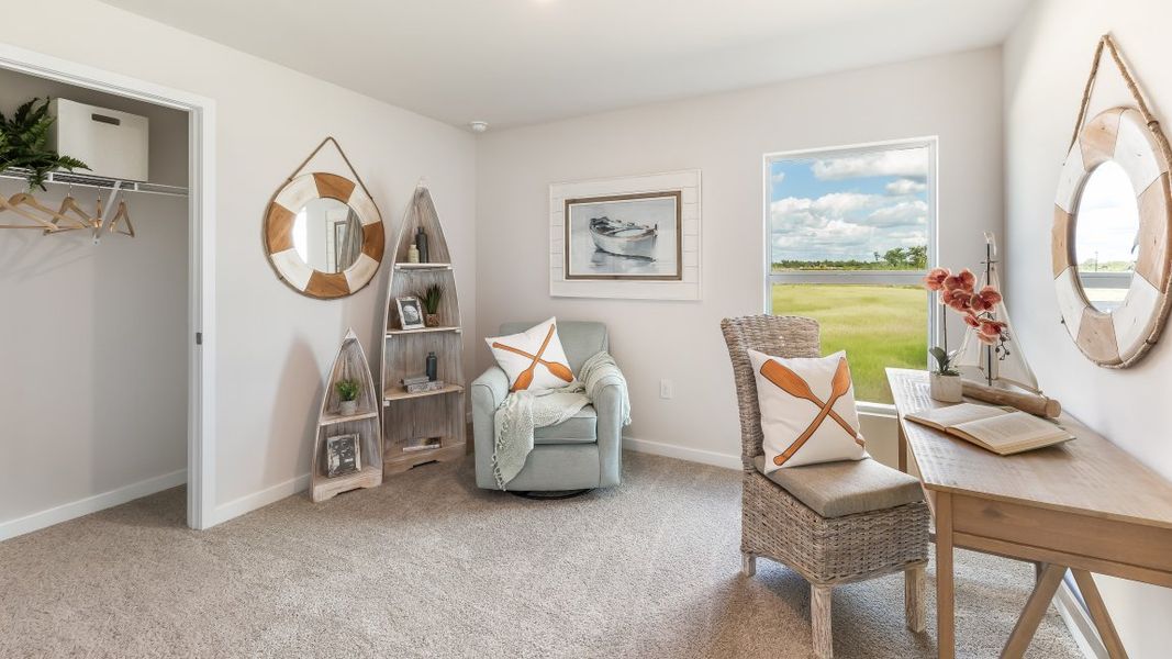 Furnished interior in a model home at Coral Lakes - Tradition & Express in Punta Gorda (Image 30).